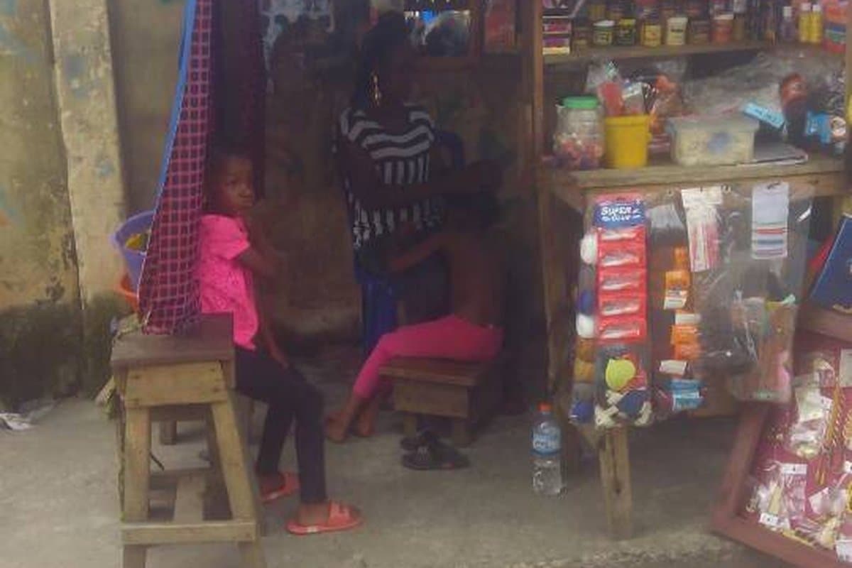 Beauty and cosmetics counter with African staff