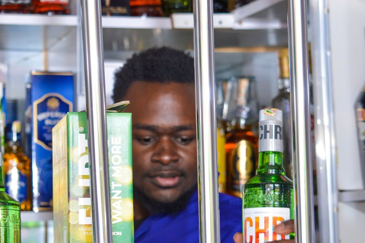 Liquor store attendant in Kenya