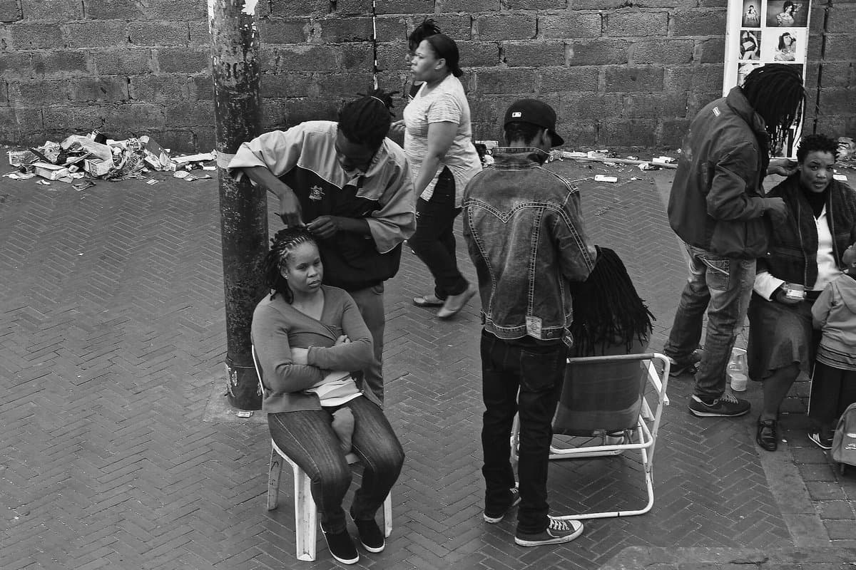 Hair salon with African staff and clients